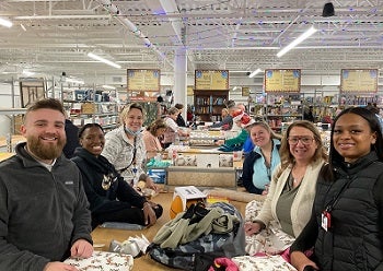 CCM team wrapping gifts
