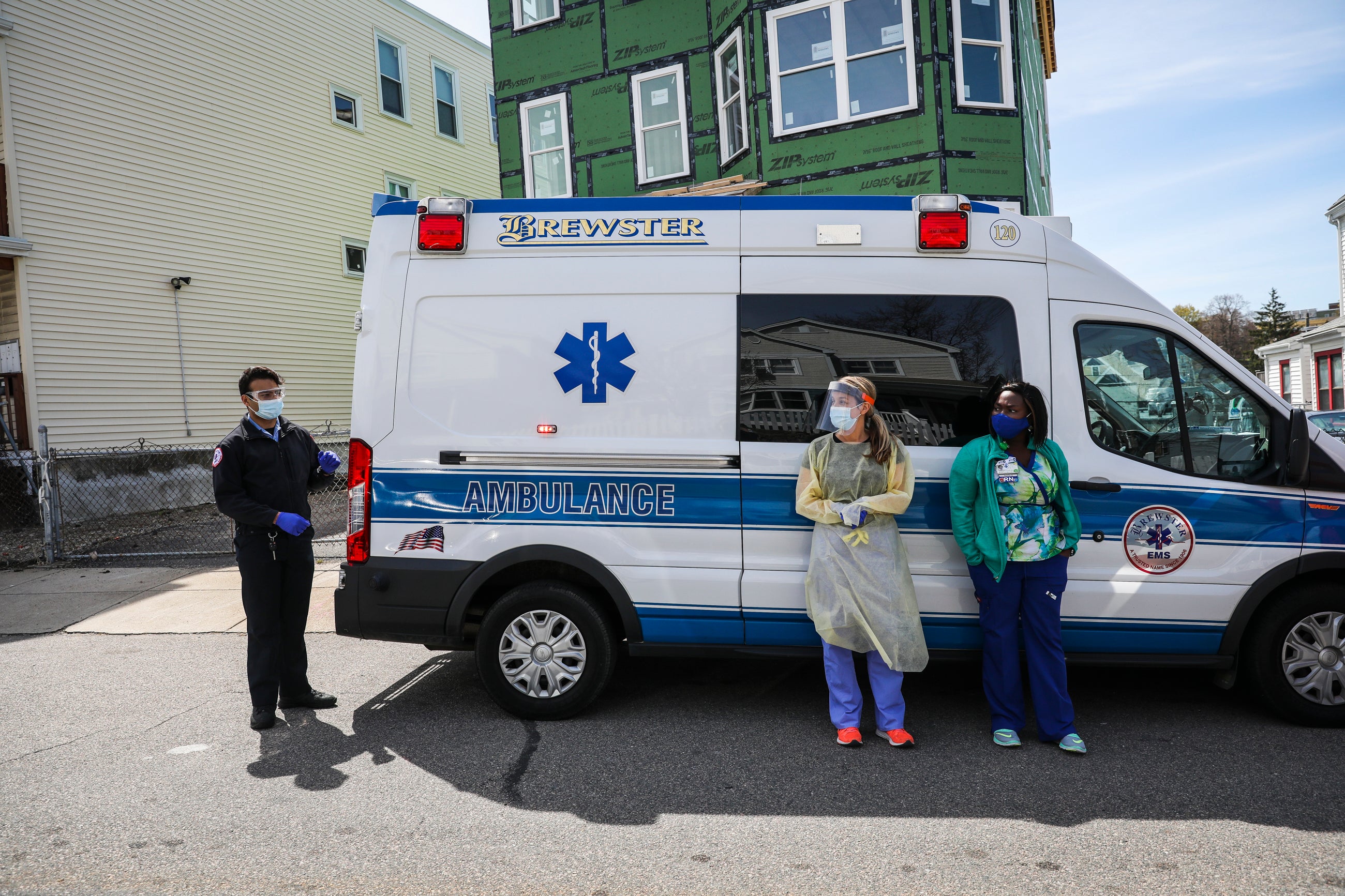 BMC providers from the department of pediatrics in front of their mobile clinic, housed within in an ambulance