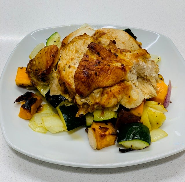 Chicken and vegetables served. 