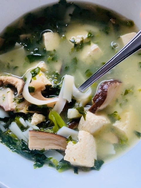 miso soup with rice noodles, mushrooms, tofu and spinach