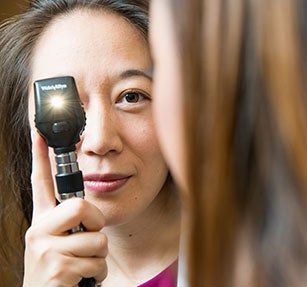 Primary care doctor is taking care of her patient.