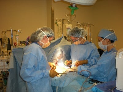 Doctors performing surgery