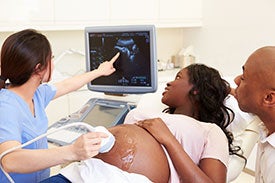 BMC pregnant couple getting ultrasound