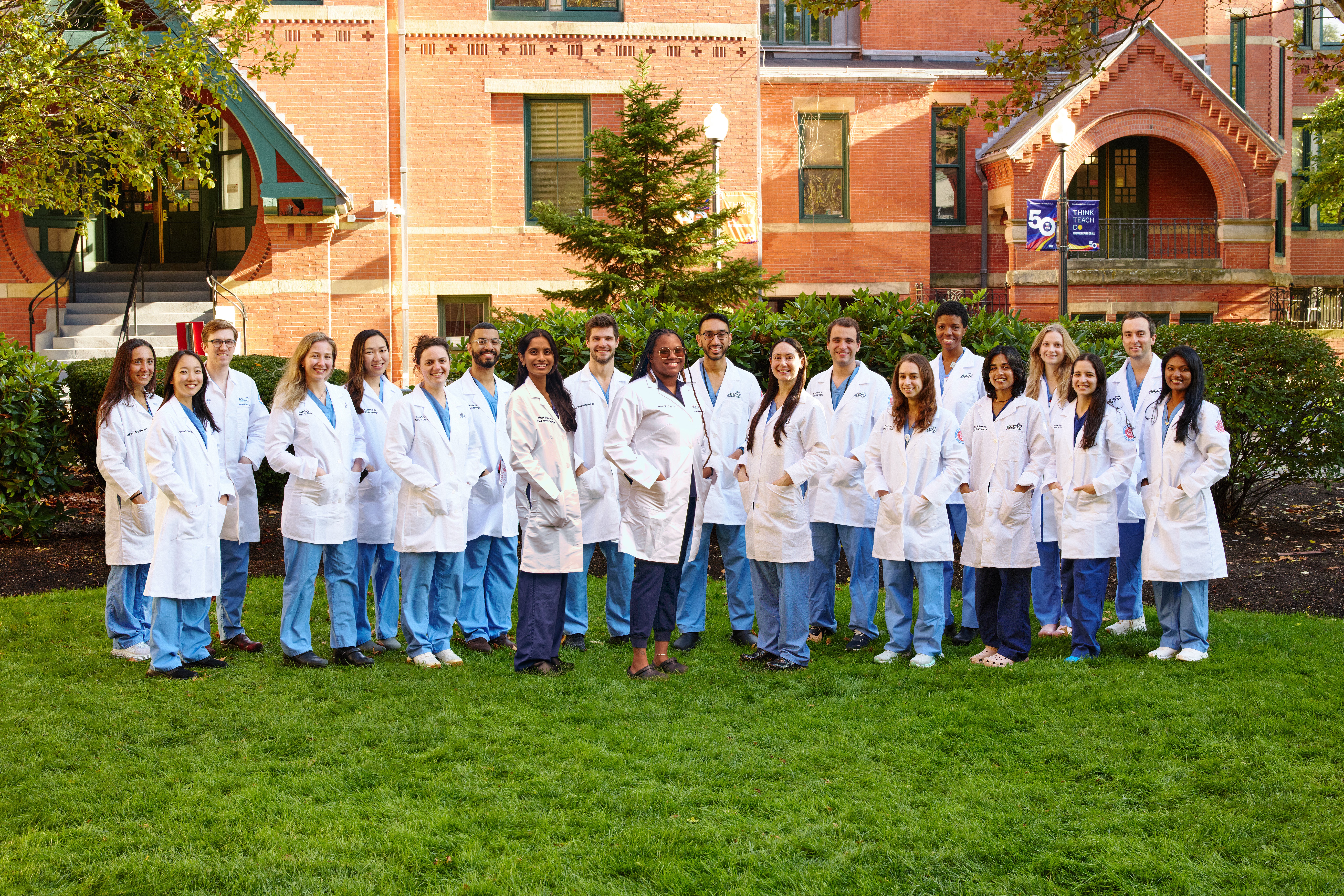 Group photo: BMC Ear, Nose, and Throat (Otolaryngology) Residents, in white coats, standing outdoors, 2025