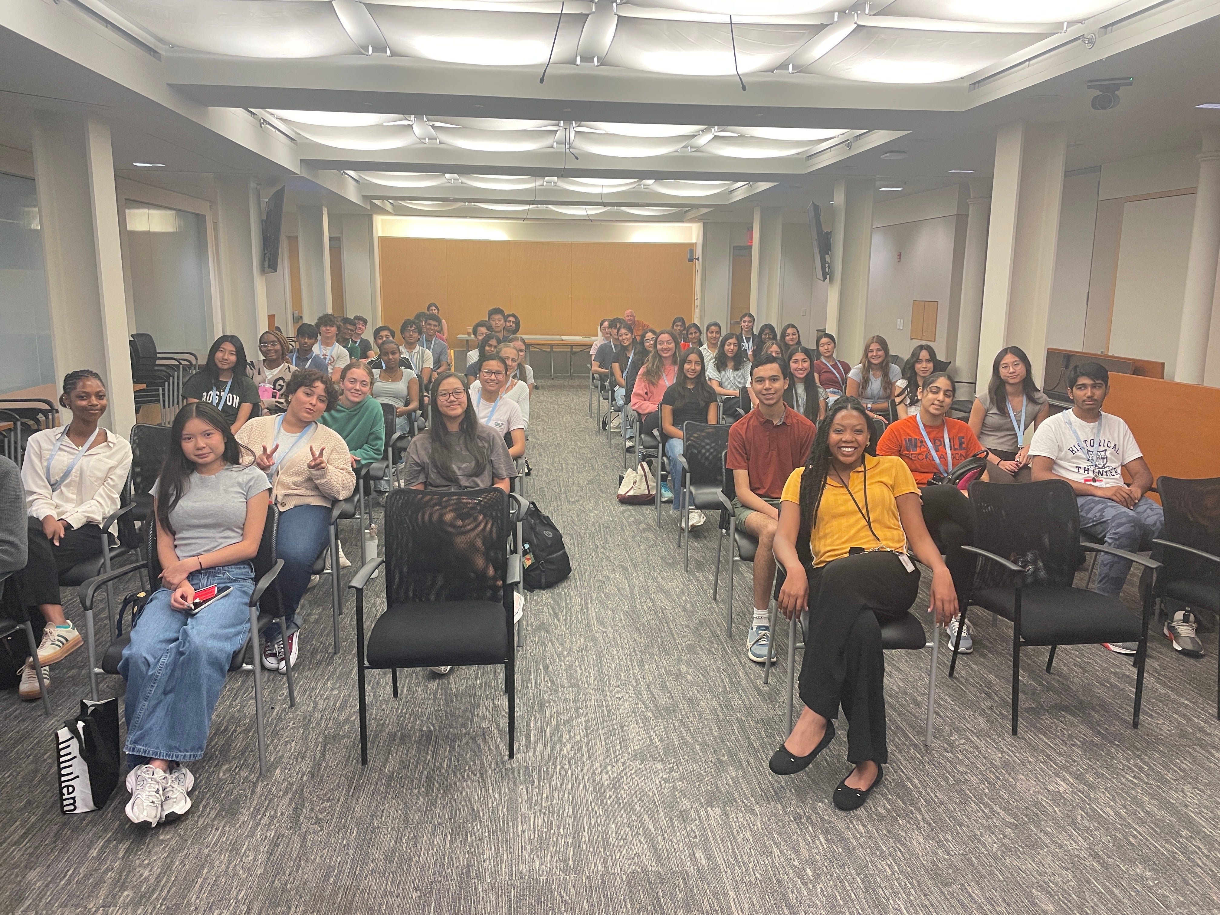 Students sitting in chairs in rows